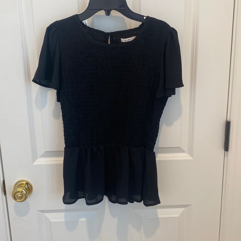 Francesca’s cinched/ flowy top